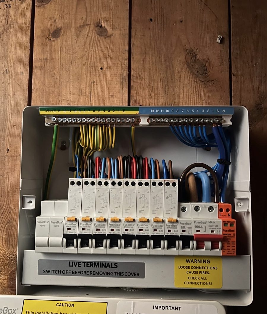 New consumer unit with surge protection wired during a full rewire by Baymead Electrical Contractors